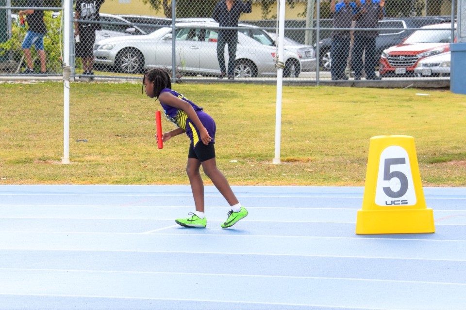 Victoria King (Prospect Primary) listens for the starter’s signal at the start of the Girls 10 & Under 4x100 Meter Relay Junior event.