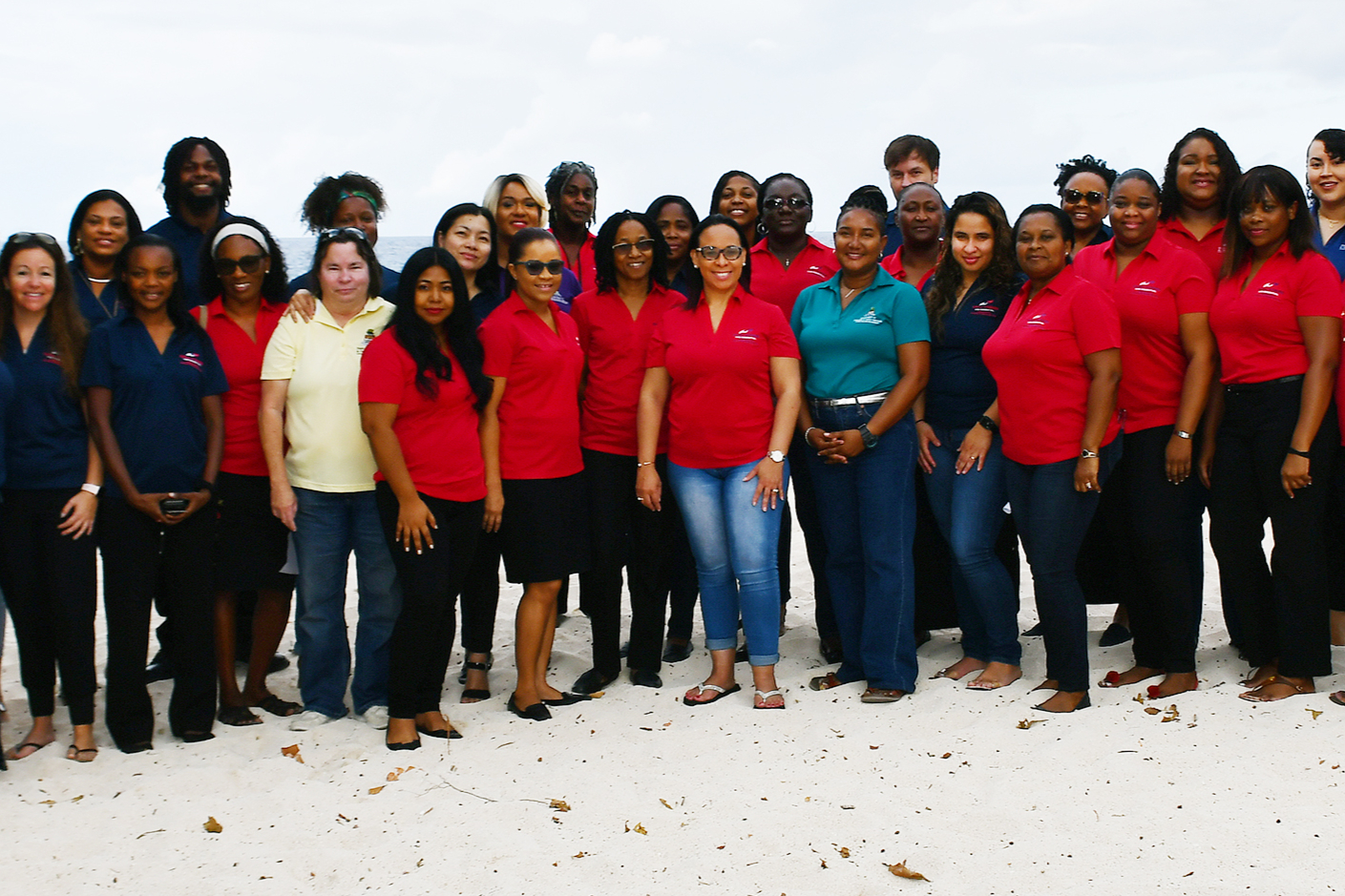 Department of Children and Family Services social work teams celebrated Social Work Month with a photo opportunity in the company of Ministry of Community Affairs Chief Officer, Teresa Echenique.